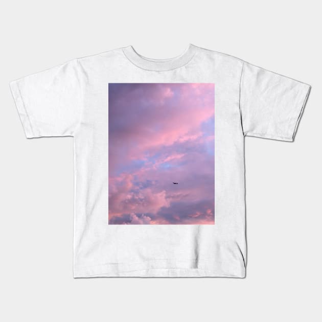 Pink Clouds Airplane Kids T-Shirt by turddemon